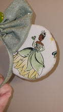 Load image into Gallery viewer, Princess Tiana with her frog Prince Mickey ears headband
