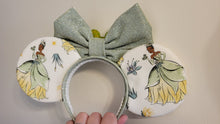 Load image into Gallery viewer, Princess Tiana with her frog Prince Mickey ears headband
