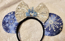 Load image into Gallery viewer, Blue and silver snowflake ears
